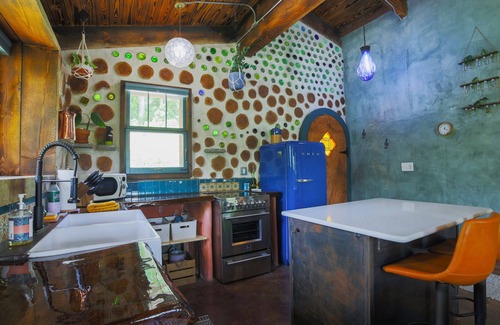 Lupton City Cabin | One-of-A-Kind: Handmade Glass Bottle & Cedar Cabin
