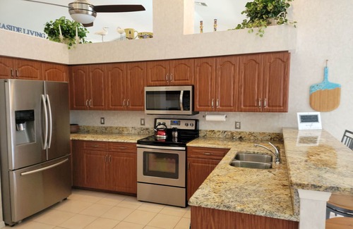 Caloosahatchee House | Orchid Lighthouse Canal Pool home with New waterfront Patio!
