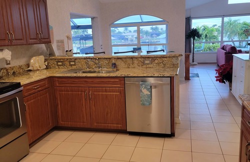 Caloosahatchee House | Orchid Lighthouse Canal Pool home with New waterfront Patio!