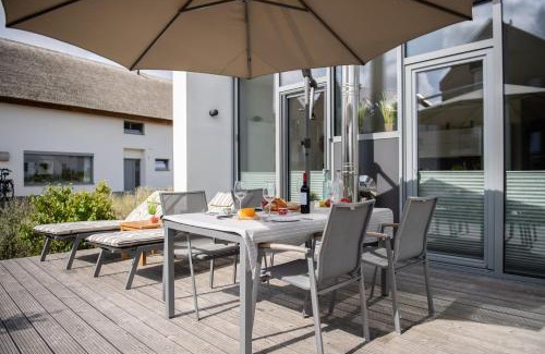 Heiligenhafen House | Ostsee - Reetdachhaus Nr 13 "Reethaus am Yachthafen" im Strand Resort