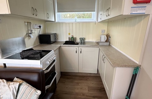 Great Yarmouth Ski Chalet | Our Hickling contemporary chalet stunning location overlooking sea & sandy beach