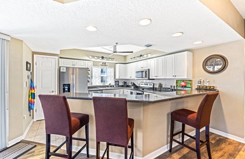 New Smyrna Beach Condo | OW15-401 Spacious Oceanwalk Corner Condo with Water Views and Easy Beach Access