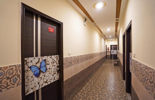 Rohini Hotel | OYO 46922 Qlark White Palace