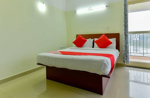 Thiruvananthapuram Hotel | OYO Flagship 10051 Hotel Tyche Stays