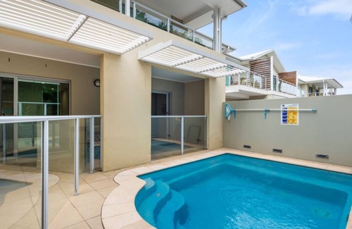 Salamander Bay Apartment | Pacific Blue, 520/265 Sandy Point Rd - private pool, air conditioning and Wi-Fi