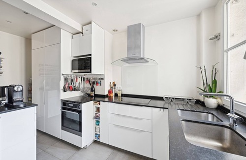 Porte-Dauphine Apartment | Palatial by the Park, by Veeve