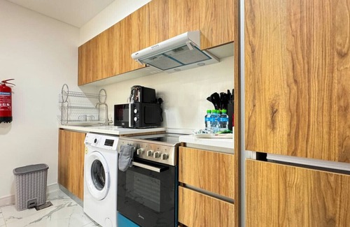 Masdar City Apartment | Palm Grove: Elegant 2BR Oasis