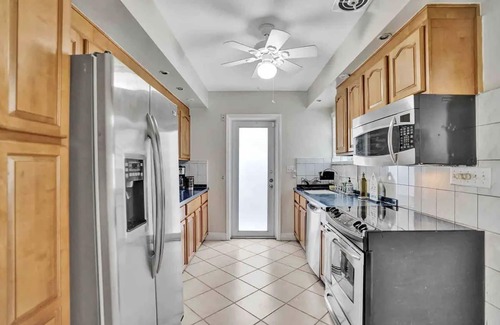 North Beach Villa | Palm Lined Oasis Walk To Beach