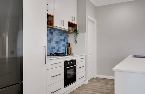 Orange House | Paradise on Prince - Sleek & Stylish, Pets Allowed