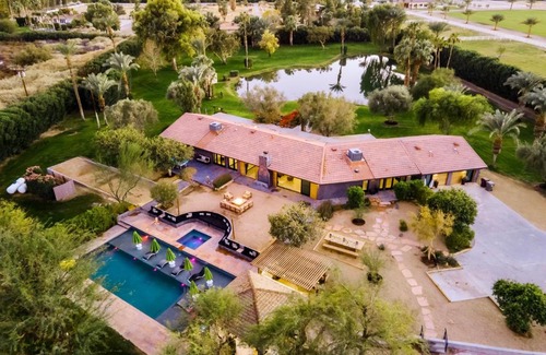 Palm Springs House | Paradiso by AvantStay Pool Lake Fire Pit Billiards Room Elegant Secluded Estate
