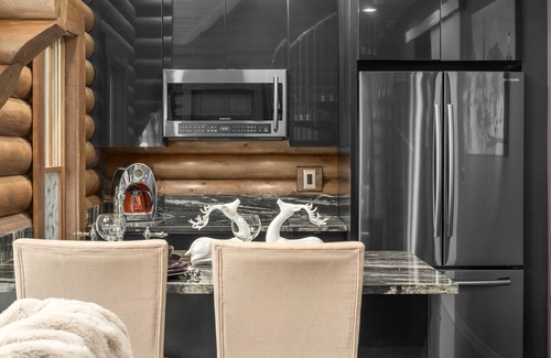 Logan Cabin | Paris Art Deco-Romanic-Opulent-Massage Chair-Sauna-Hot Tub-Kayaks-FireTable