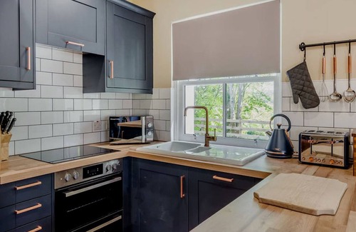 Newbridge House | Pass the Keys | Beautiful Cottage in Historical Robert Burns Farm