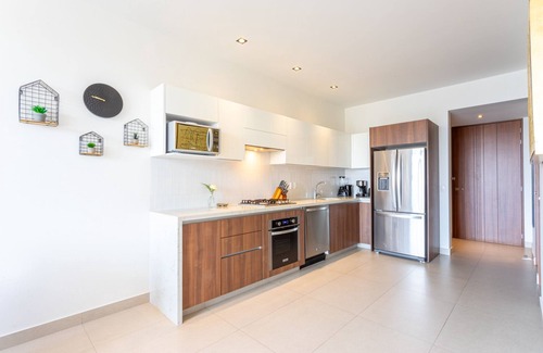 Bucerias Condo | PAVILION 2BR, Rooftop Infinity Pool & Jacuzzi with AMAZING views of the ocean.