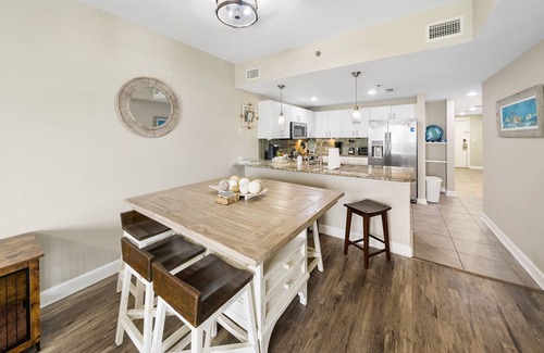 Panama City Beach Condo | PCB condo with gulf views, pools, hot tub, tiki bar and more! small dog ok