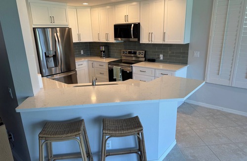 Bonita Bay Condo | Peaceful Bonita Bay Getaway with stunning view of lake and golf course.