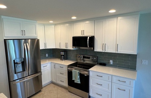 Bonita Bay Condo | Peaceful Bonita Bay Getaway with stunning view of lake and golf course.