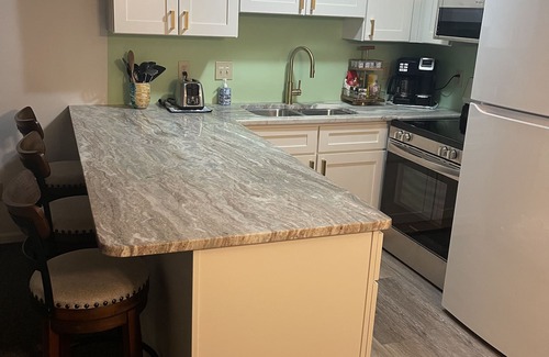 Emerald Isle Condo | Peaceful, Gated community with Indoor & Outdoor Pools.Walk to dining and fun!