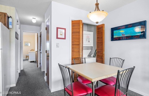 Emerald Isle Condo | Peaceful, Gated community with Indoor & Outdoor Pools.Walk to dining and fun!