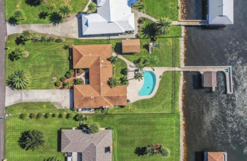 Northside House | Peaceful Island Retreat - Heated Pool - Gym - Private Dock