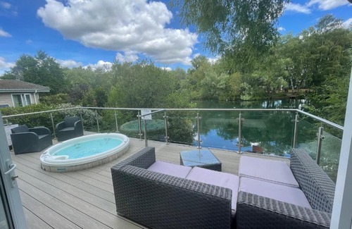 Tattershall House | Peaceful Lakeside Lodge LF with hot tub, private fishing peg situated Tattershall Lakes