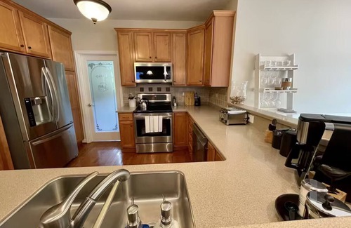 Livingston House | Peaceful, lakeside retreat-private pool, hot tub, private dock, boatslip & more!