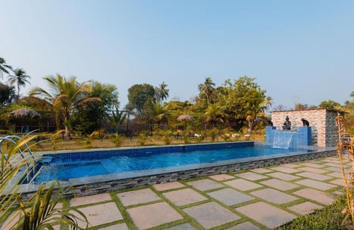 Nagoa House | Peacock Retreat 4BR Cottages with Private Pool & Scenic Views Saligao