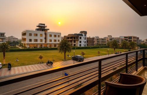 Zira Hotel | Pearl Grand Boutique Cottage in Omaxe Anandam Vrindavan - #premium AC rooms with balcony #big parking #lift #garden #peaceful area #near prem mandir #property of the year #most awarded