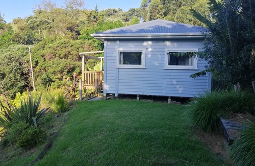 Tutukaka Cottage | Pebble cottage. Tutukaka Coast. Short walk to a nearby beach. Pet friendly.