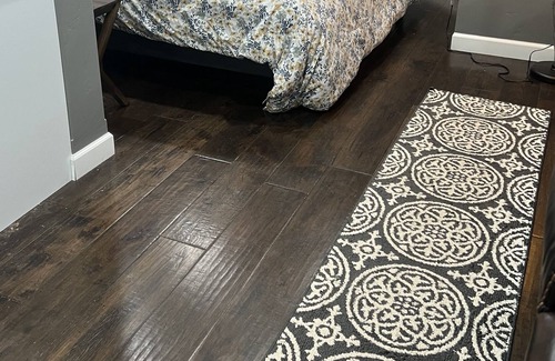 Negaunee Apartment | Peck Street’s Modern Oasis & Jacuzzi!