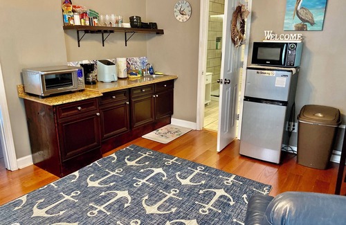 Northeast Pensacola Apartment | Pelican Nest-Charming Suite/Pool/Jacuzzi Tub/Private Balcony!