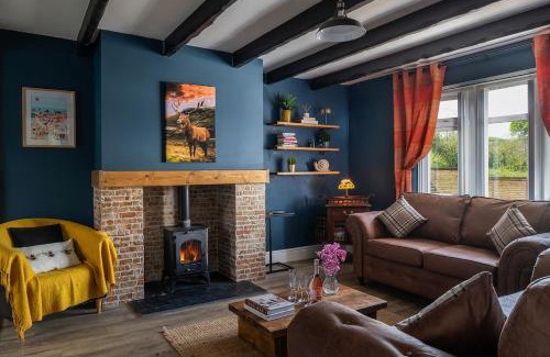 St George House | Pen y coed with hot tub and sauna surrounded by countryside views