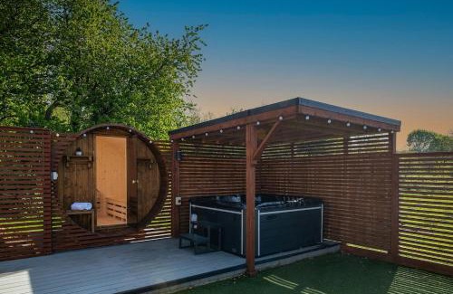 St George House | Pen y coed with hot tub and sauna surrounded by countryside views