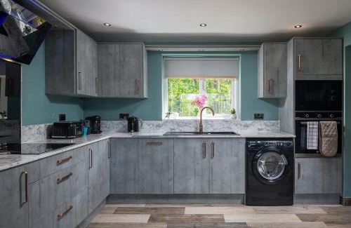 St George House | Pen y coed with hot tub and sauna surrounded by countryside views