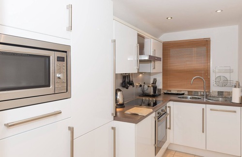 West Looe House | Penthouse apartment with stunning views of Looe bay and harbour.