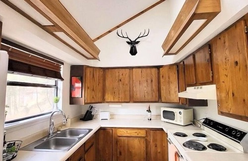 Ruidoso Cabin | Perched in the pines -wrap around porch w/outdoor dining, fire pit, & wildlife