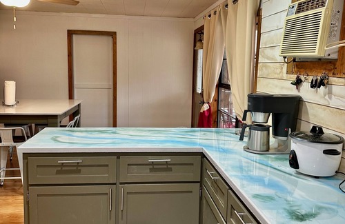 Ore City House | Pet-friendly campground cabin retreat w/shared pool, firepit, lake access