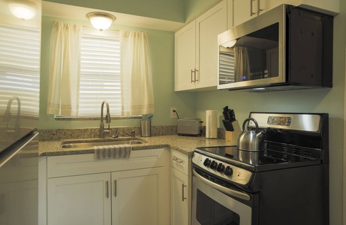 Cocoa Beach House | Pet friendly fenced yard, 4 minute walk to the beach. Close to restaurants