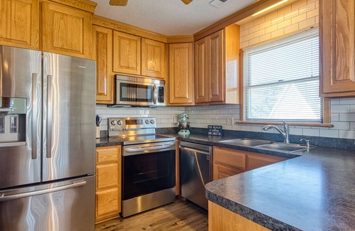 Kill Devil Hills House | Pet friendly, ocean side cottage only 5 minute walk to beach access!