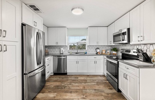 Butler Beach House | Pet Friendly | Pool | Waterfront | Private Beach Access