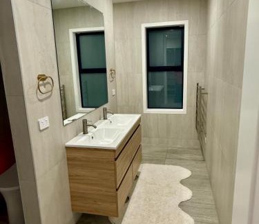 Karaka House | Pet Friendly Riverfront Minimalist Karaka Stay Prime Location