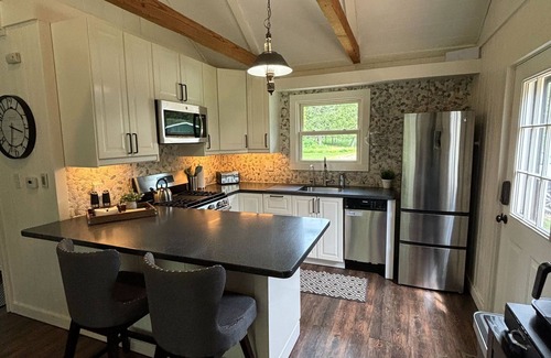 Hessel Cottage | Pine River Cottage: Crisp Air & Colorful Leaves – A Fall Retreat by the River!