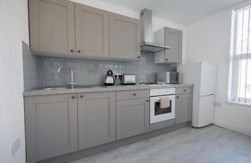 Hull Apartment | Platform Stadium apartment with parking