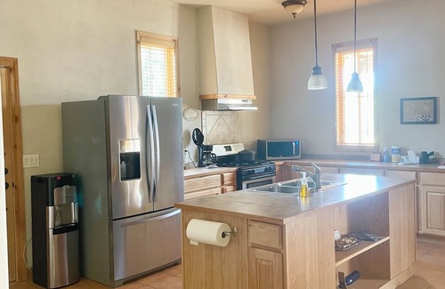 Mesilla Park House | Pomegranate Stand