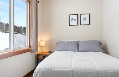 Houghton House | Pontoon boat, snowmobile rentals available next door!