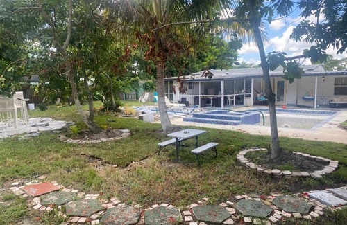 Florida Gardens Apartment | Pool House, Hot Tub, Fire Pit, and Gazebo