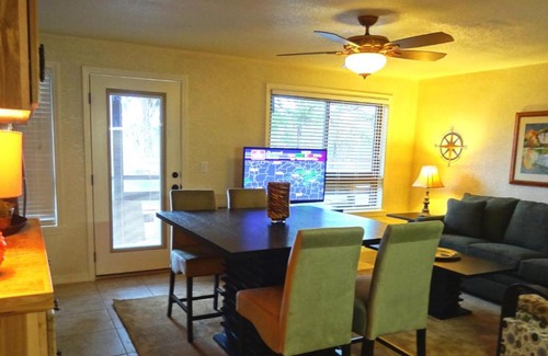 Mount Ida Hotel | Poolside Queen Cabana with two queen beds, full kitchen and pool access overlooking Lake Ouachita, Hotel Room