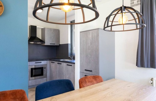 Ewijk House | Prachtige vakantiewoning op park aan zwemwater