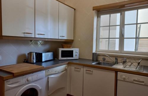 Praia del Rei Apartment | Praia Del Rey PoolGolfView