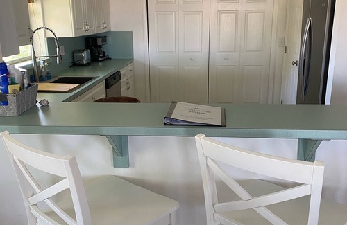 Goodland House | Premiere location on the water, walking distance to Stan's!