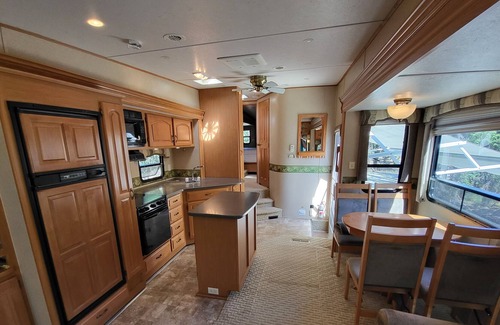 Funny River Cabin | Premium Alaskan 5th wheel in Private setting